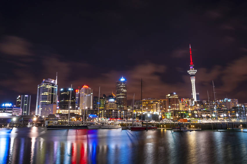 Skyline photo of the biggest city in the New Zealand, Auckland. The photo was taken at night, after sunset across the bay